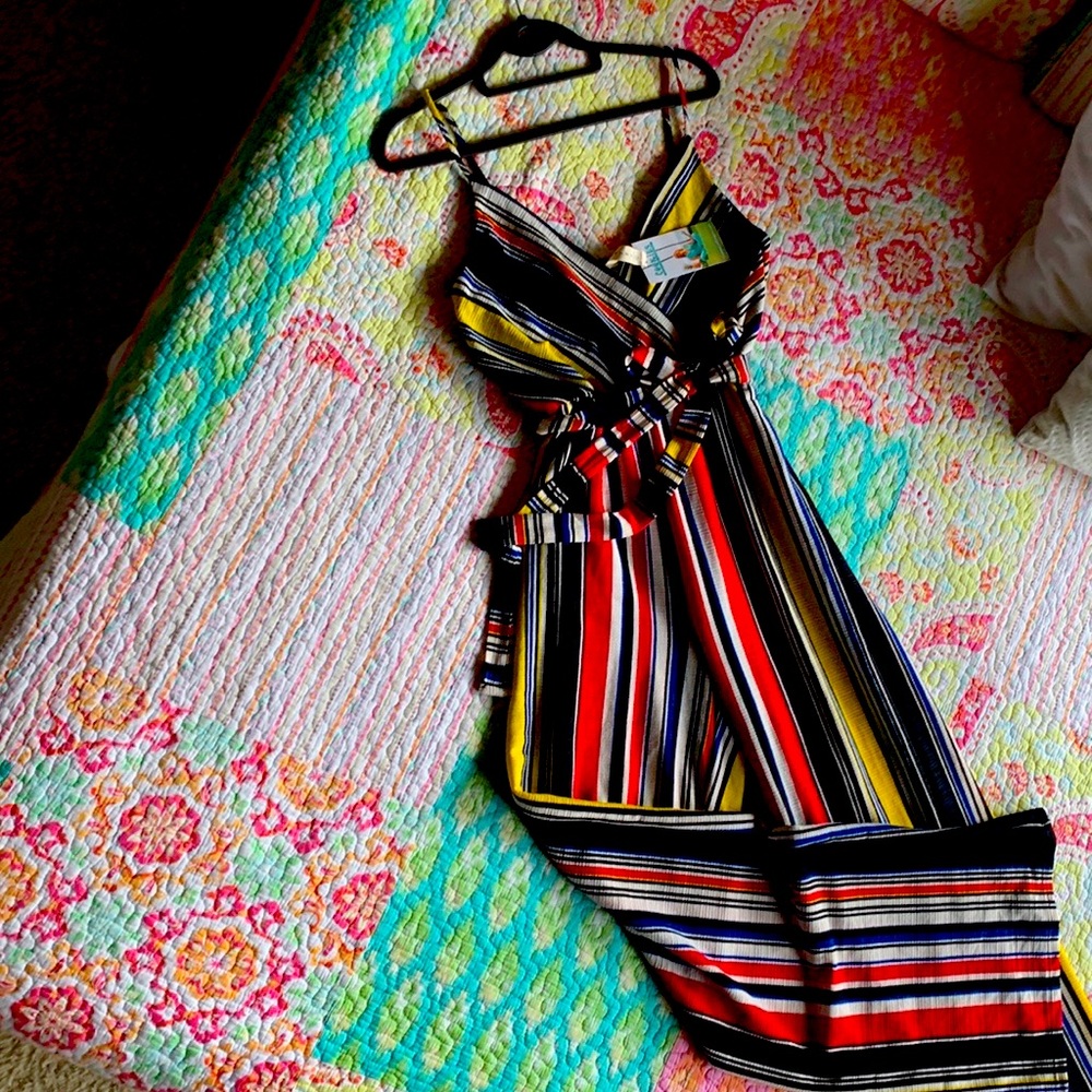 Striped Jump Suit. Elastic high waist and a matching tie-belt.